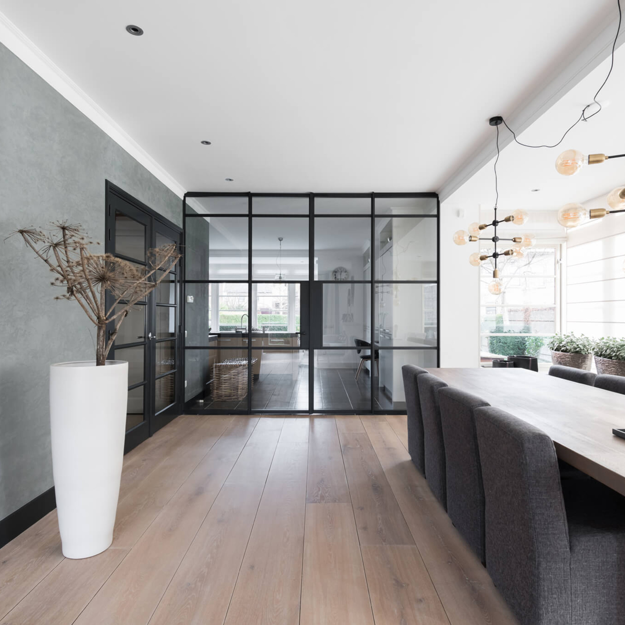 dubbele scharnierdeuren GewoonGers stalen deuren glaswand industrieel